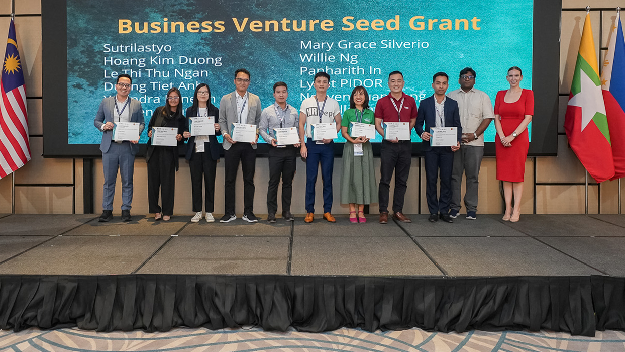 student winners showing their awards from business venture seed grant