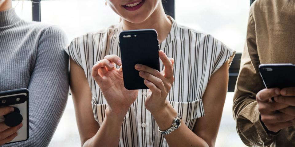 Woman Holding Phone